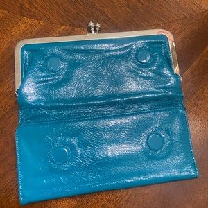 Folding leather clutch